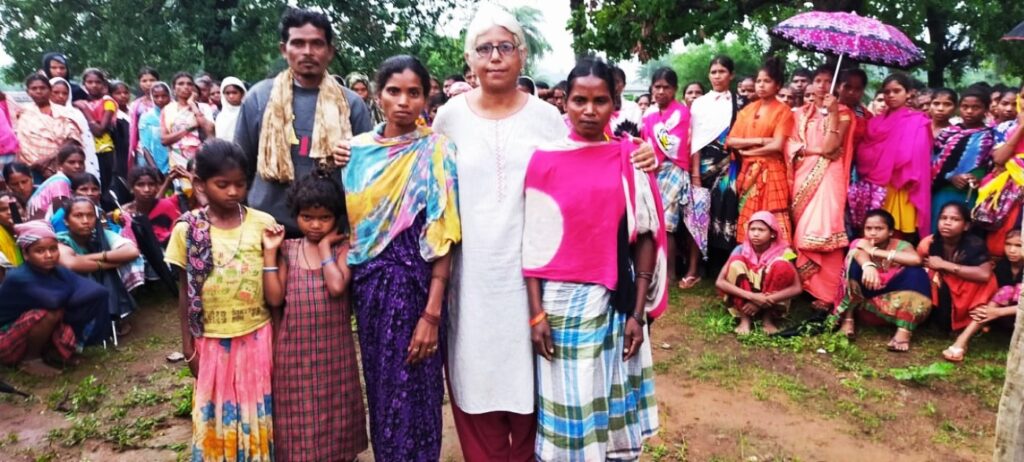 Bela Bhatia with the family members of two individuals killed in extrajudicial encounters in Nilawaya village, Dantewada district, Chhattisgarh