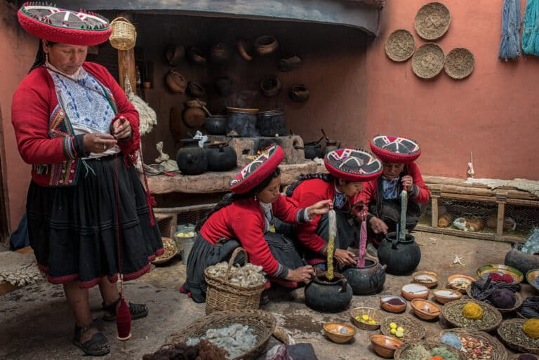 A group of women from a Quechan community spinning and dyeing fibers