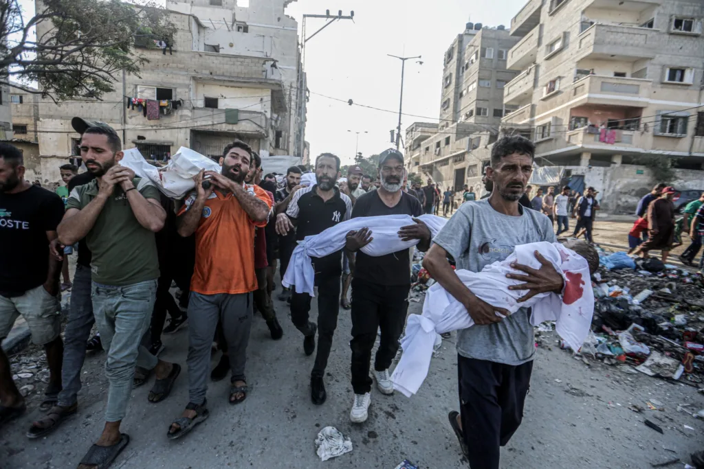 a funeral procession for Palestinians killed during the ongoing conflict in the Gaza Strip