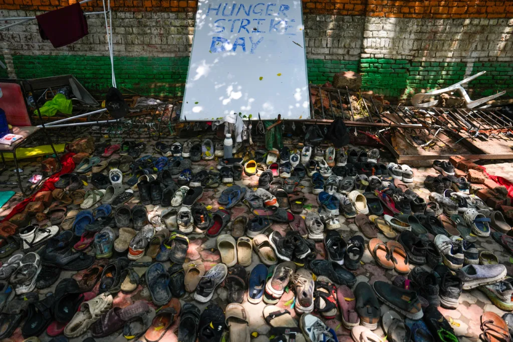 Shoes left behind after the July 20 police crackdown, collected and displayed at Jantar Mantar.