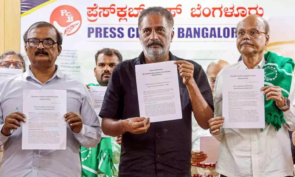 Actor Prakash Raj (centre) and others during a press conference regarding the FIR prepared by the Karnataka's Civil Society Organisations against the Election Commission of India, in Bengaluru/ Photo Credit: PTI